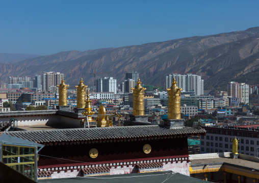 Rongwo monastery in front of the modern town, Tongren County, Longwu, China