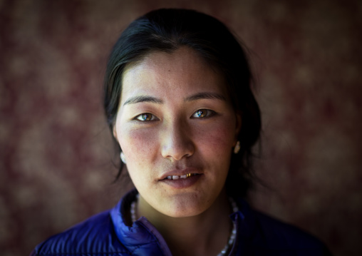 Portrait of a beautiful tibetan nomad woman, Tongren County, Longwu, China