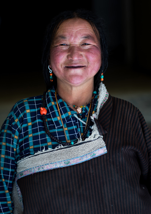 Portrait of a tibetan woman, Qinghai province, Tsekhog, China