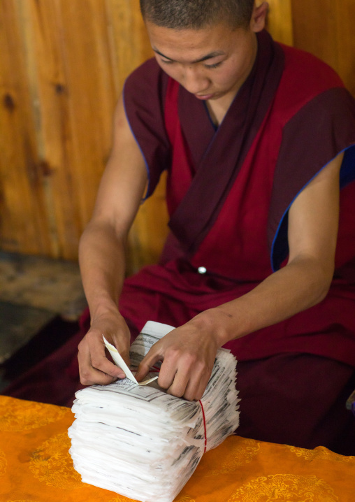 Tibetan scriptures printed from wooden blocks and packed in the monastery traditional printing temple, Gansu province, Labrang, China