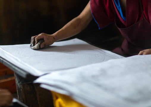 Tibetan scriptures printed from wooden blocks in the monastery traditional printing temple, Gansu province, Labrang, China