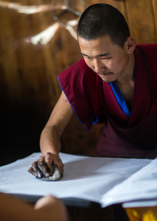 Tibetan scriptures printed from wooden blocks in the monastery traditional printing temple, Gansu province, Labrang, China