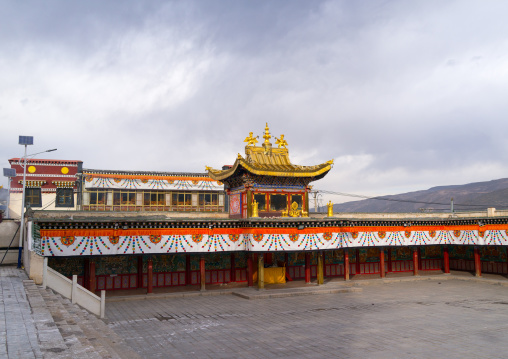 Prayer wheels alley in Rongwo monastery, Tongren County, Longwu, China