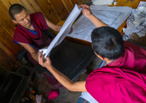 Tibetan scriptures printed from wooden blocks in the monastery traditional printing temple, Gansu province, Labrang, China