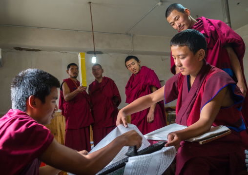 Tibetan scriptures printed from wooden blocks in the monastery traditional printing temple, Gansu province, Labrang, China