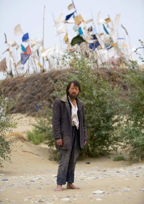 Uyghur Sufi Man At Imam Asim Tomb In The Taklamakan Desert, Xinjiang Uyghur Autonomous Region, China