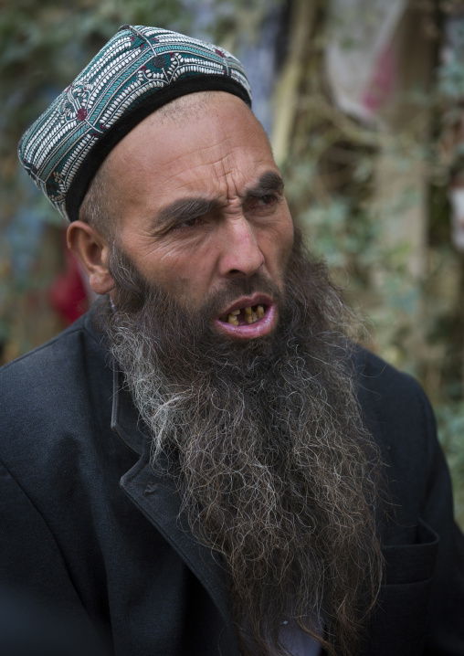 Uyghur Sufi Men Praying At Imam Asim Tomb In The Taklamakan Desert, Xinjiang Uyghur Autonomous Region, China