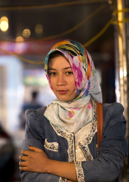 Young Uyghur Woman In Night Market, Hotan, Xinjiang Uyghur Autonomous Region, China