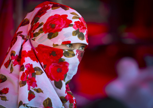 Young Uyghur Woman With Covered Face And Colourful Headscarf, Xinjiang Uyghur Autonomous Region, China