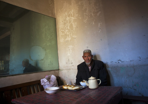 Uyghur Man In Ostangboyi Tea House, Kashgar, Xinjiang Uyghur Autonomous Region, China