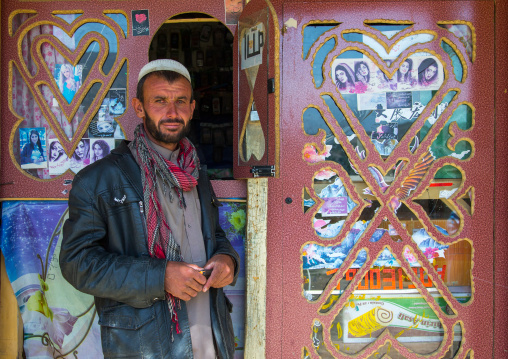 Afganh man selling music and dvd in the market, Badakhshan province, Ishkashim, Afghanistan