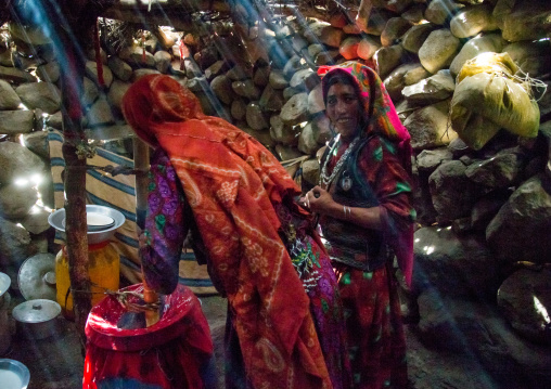 Wakhi nomad women making butter in the pamir mountains, Big pamir, Wakhan, Afghanistan