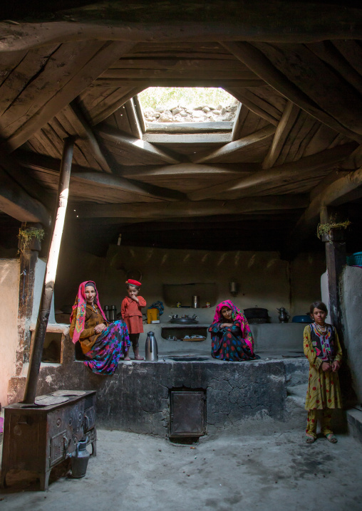 Afghan family inside their traditional pamiri house, Badakhshan province, Wuzed, Afghanistan