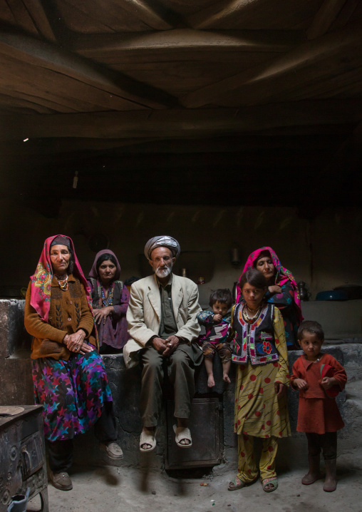 Afghan family inside their traditional pamiri house, Badakhshan province, Wuzed, Afghanistan