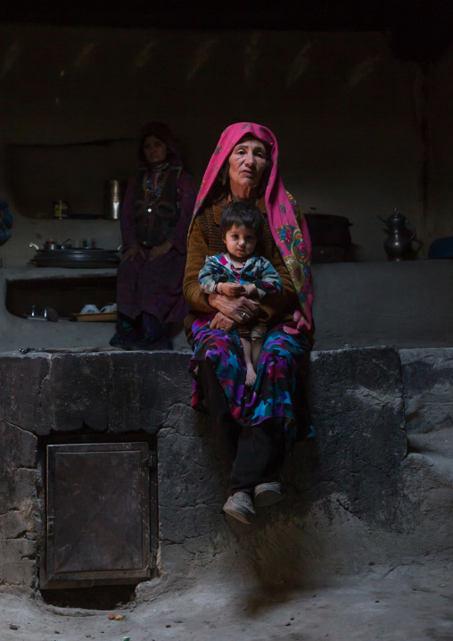 Afghan mother and her daughter inside their traditional pamiri house, Badakhshan province, Wuzed, Afghanistan