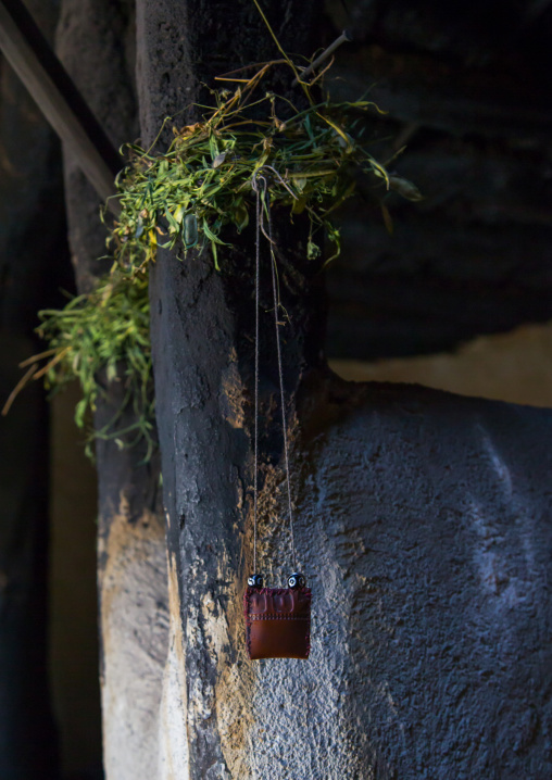 First grass cut of the year tied to a pilar in a pamiri house to bring luck, Badakhshan province, Wuzed, Afghanistan