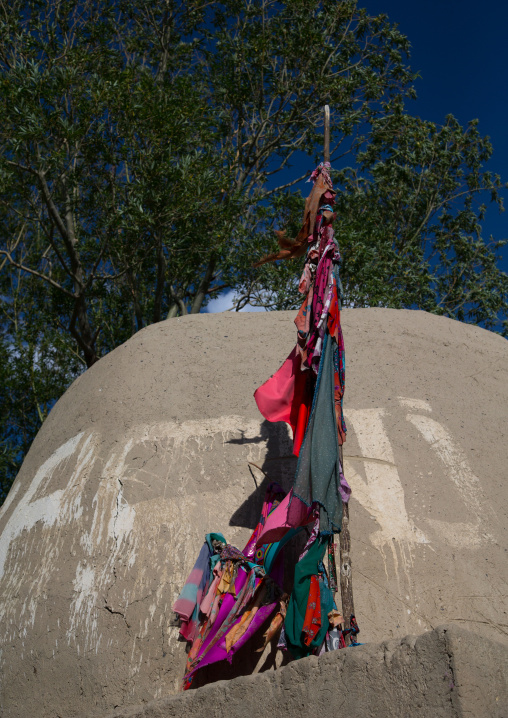 Flags on the top of an old shrine, Badakhshan province, Khandood, Afghanistan