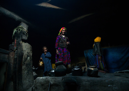 Afghan family inside their traditional pamiri house, Badakhshan province, Khandood, Afghanistan