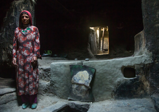 Afghan woman inside her traditional pamiri house, Badakhshan province, Qazi deh, Afghanistan