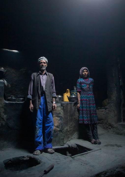 Afghan couple inside their traditional pamiri house, Badakhshan province, Qazi deh, Afghanistan