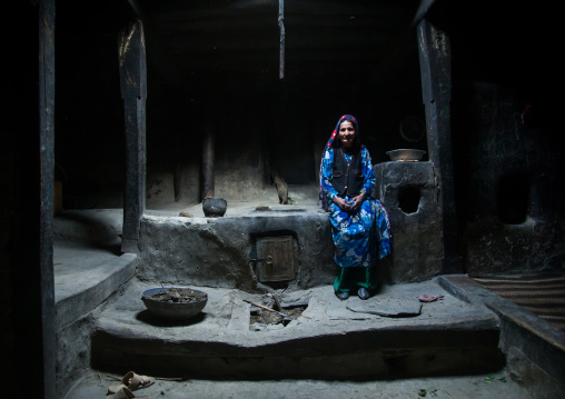 Afghan woman inside her traditional pamiri house, Badakhshan province, Qazi deh, Afghanistan