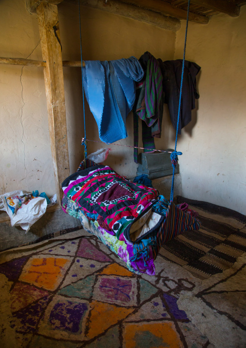 Burka in front of a baby craddle, Badakhshan province, Zebak, Afghanistan