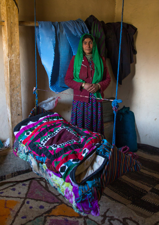 Woman in front of a craddle, Badakhshan province, Zebak, Afghanistan