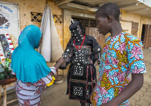 Benin, West Africa, Porto-Novo, egoun egoun spirit of the deads asks money to people in exchange of blessings