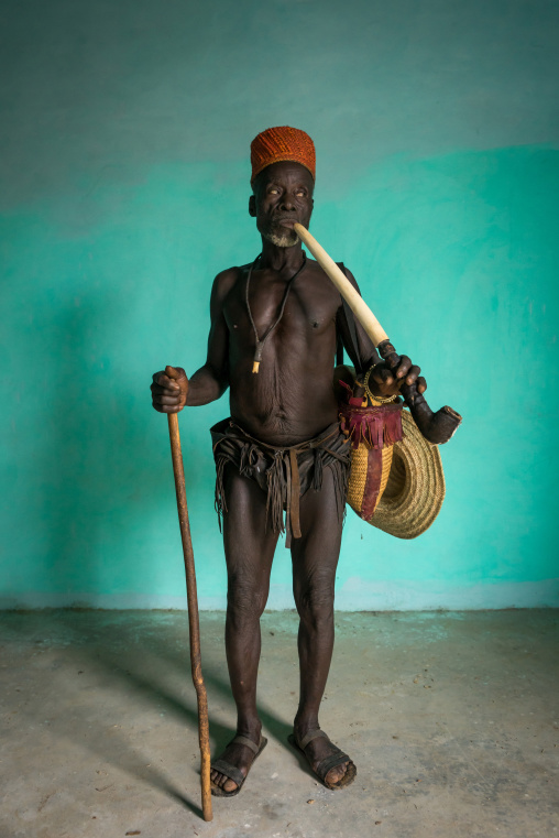 Benin, West Africa, Taneka-Koko, traditional healer called mister tcholi with his giant pipe