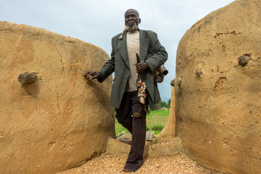 Benin, West Africa, Boukoumbé, mr kouagou maxon on the terrace of his traditional tata somba house