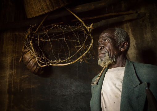 Benin, West Africa, Boukoumbé, mr kouagou maxon in his traditional tata somba house and his traditional medicine