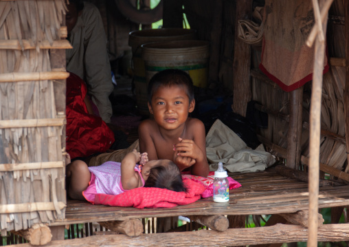 Cambodian children in the floating village on Tonle Sap lake, Siem Reap Province, Chong Kneas, Cambodia