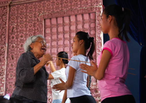 Cambodian dancers with their teacher during a training session of the National ballet, Phnom Penh province, Phnom Penh, Cambodia