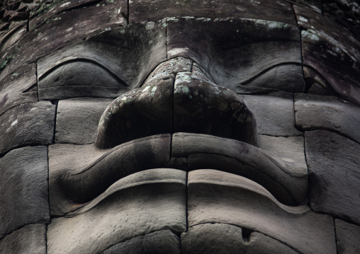 Giant buddha face inside Bayon temple, Siem Reap Province, Angkor, Cambodia