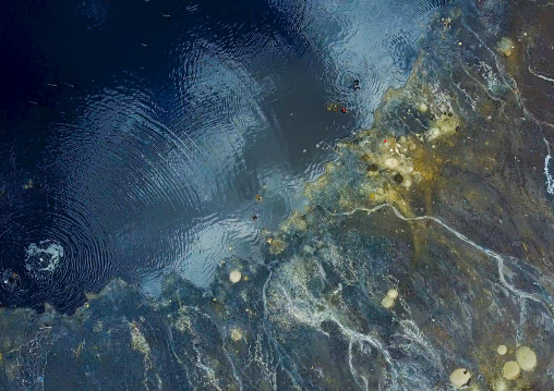 Aerial view of the volcano crater where Borana tribe men dive to collect salt, Oromia, El Sod, Ethiopia