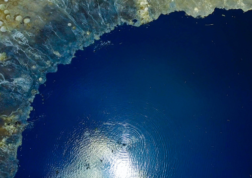 Aerial view of the volcano crater where Borana tribe men dive to collect salt, Oromia, El Sod, Ethiopia