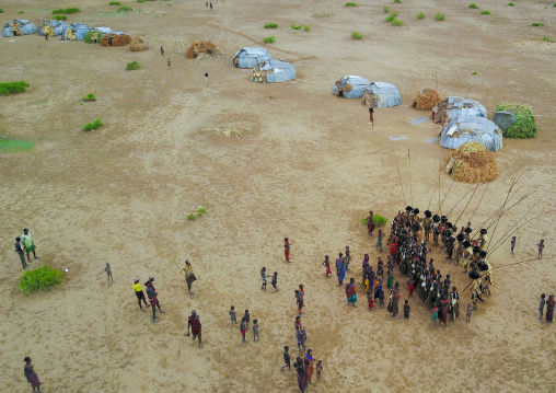 Aerial view of dimi ceremony in the Dassanech tribe to celebrate circumcision of teenagers, Omo Valley, Omorate, Ethiopia