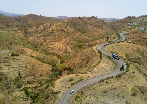 Aerial view of a truck passing in the Konso hills and terraces, Omo Valley, Konso, Ethiopia