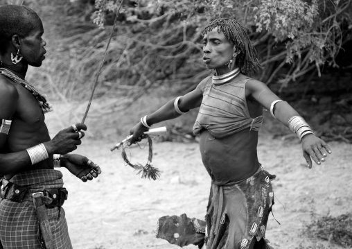 Whipping Of A Hamer Woman In Pain During Bull Leaping Ceremony, Omo Valley, Ethiopia