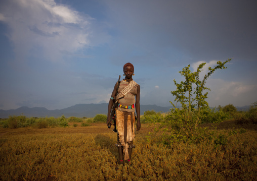 Banna Teenage Girl Standing With A Kalashnikov Rifle Jumping Ceremony Ethiopia