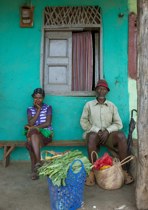 Couple of people in jinka with basket full of vegetables Ethiopia