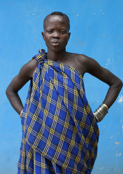 Bodi Woman Wearing Traditional Loincloth With Scarified Forearms And Metal Bracelets Hana Mursi Village Omo Valley Ethiopia