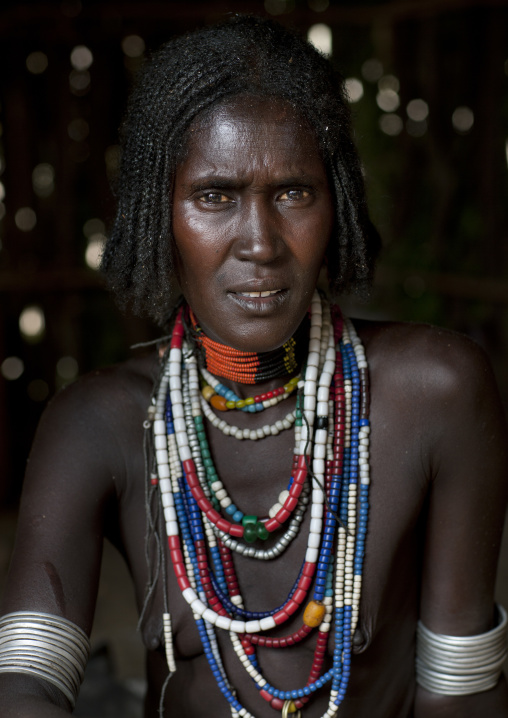 Portrait Of Beautiful Erbore Tribe Woman Wearing Beaded Necklace,  Omo Valley, Ethiopia