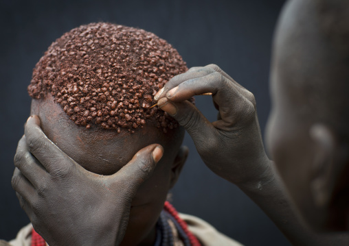 Karo Woman Getting Hair Dressed With Ochre Dye  Omo Valley Ethiopia