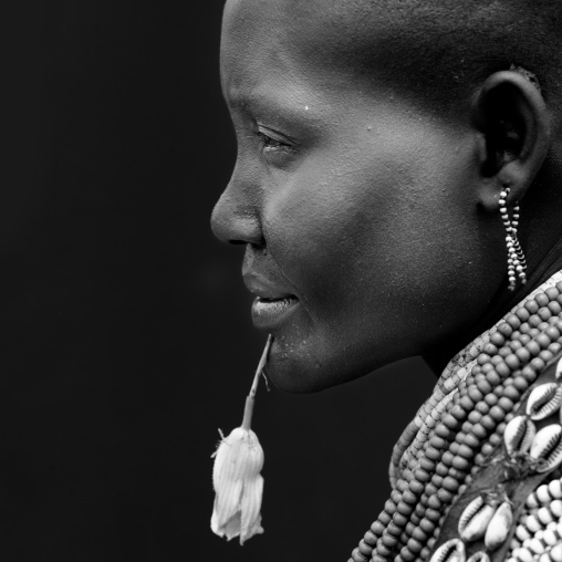 Portrait Of Beautiful Dark Eyed Karo Woman Wearing Beaded Necklace Ethiopia