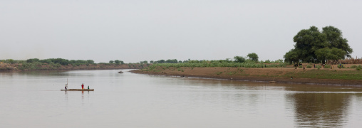 People on pirogue on omo river omo valley Ethiopia