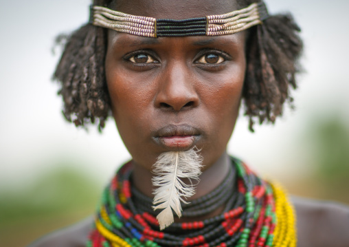 Dassanech Woman Portrait With Beaded Necklaces And Feather Omo Valley Ethiopia