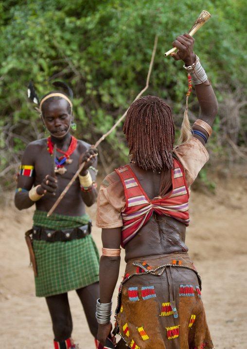 Whipper In Front Of The Hamer Woman He Is About To Flog Celebrating Bull Jumping Ceremony Ethiopia