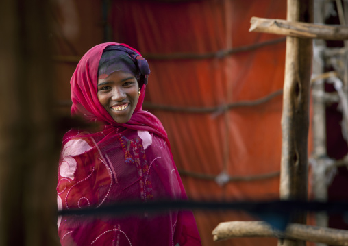 Portrait Of An Oromo Tribe Girl With Toothy Smile, Harar, Ethiopia