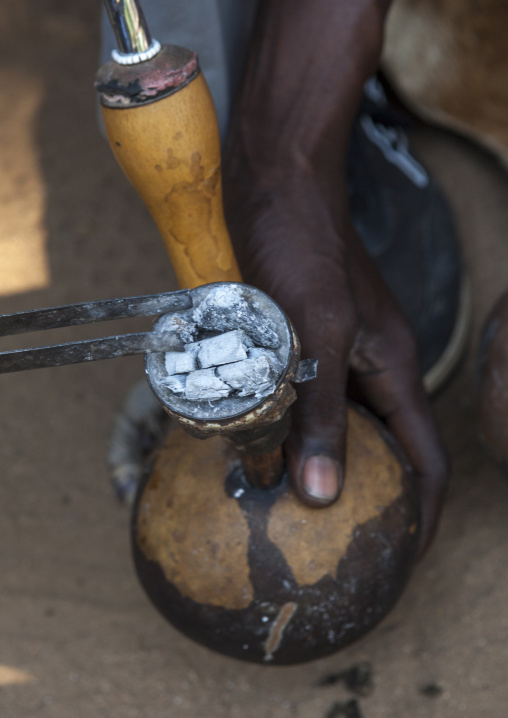 Woman Smoking A Waterpipe From Anuak Tribe, Gambela, Ethiopia